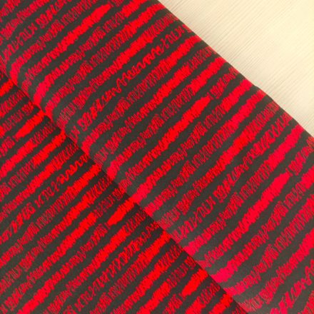 Mintás pamut jersey piros /fekete hosszában stilizált csíkos 150 cm