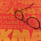 Karácsonyi vászon piros / arany feliratos 140 cm széles