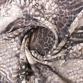   Mintás muszlin szürke / fekete / fehér ocelot minta 150 cm széles