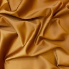Ruha szatén óarany 145 - 150 cm széles 350 grammos