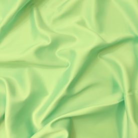 Ruha szatén halvány zöld 145 - 150 cm széles